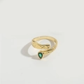 Gold plated crisscross ring with green teardrop gemstone and snake skin texture - Green Zircon Style