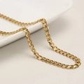 Flat gold Cuban link chain necklace for men with brushed matte finish on a ceramic tray - 4mm*45cm