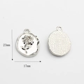 Macro detail of silver rose oval charm with dimensions 17mm by 23mm for DIY jewelry - Silver