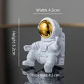 Sitting white astronaut ornament with gold visor, 5.2cm mini moon astronaut statue - Gold Astronaut Ornament