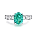 Luxurious S925 sterling silver ring with oval emerald gemstone and clear zircons - US 6 / Paraiba Green