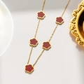 Elegante goldfarbene Halskette mit fünf leuchtend roten vierblättrigen Kleeblatt-Anhängern - 967 Halskette Rote Muschel Gold