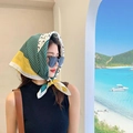 Green and yellow geometric print silk scarf worn as a retro headwrap for summer style - Green Moon