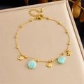 Golden double layer stainless steel anklet with shell, dolphin, and sea star pendants - Little Fish Light Blue Stone Style (B1609)