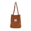 Detail of caramel corduroy tote bag showing striped texture and woven textile label - Brown