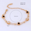 Detail of double-layer gold titanium bracelet with black and white circular charms - Black and White (Gold Chain)