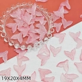 Detail view of pink translucent fish tail charms for DIY jewelry with 19x20x4mm dimensions - Light Pink Fish Tail