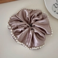 Champagne oversized satin scrunchie with delicate white pearl trim and silk finish - Champagne