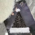 Weihnachtsmütze mit gold-schwarzen Pailletten und Plüschrand auf festlichem Hintergrund - 31*47cm / Schwarz Champagner