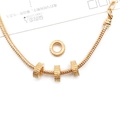 Golden snake chain bracelet with frosted textured cylinder beads and extra charm charm - Round Loop Bead (15885) / 1 Piece (3x10mm) / KC Gold