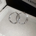 Elegant silver circle earrings with sparkling rhinestone crystals in a jewelry box - Twisted Rhinestone Hoop (Silver Earring Post)