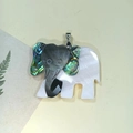 Macro detail of handmade elephant shell pendant with black pearl and abalone inlay - C10730-Black Lip & White Shell with Abalone (Elephant)