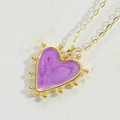 Collana con ciondolo a cuore viola e bordo dorato a perline su fondo di pelle - Viola