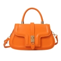 Chic orange faux leather shoulder bag with a gold lock and structured top handle - Orange