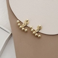 Elegant gold beaded ear clips in minimalist curved design for non-pierced ears - Spiral Clip-on Style