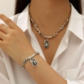 Silver necklace and bracelet set featuring dark grey irregular acrylic pendants - Bracelet And Necklace Vintage Set (36)