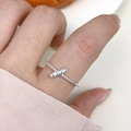 Minimalist s925 sterling silver ring with a silver cross and twisted rope texture design - Baguette