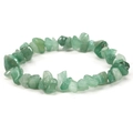 Macro shot of natural irregular green stone beads with elastic cord on white background - Green Aventurine