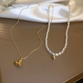 Golden heart pendant chain paired with a white rice pearl necklace and golden bead - Gold Heart Pearl 2-piece Set