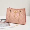 Pink quilted ladies shoulder bag with gold chain strap and deer charm detail - Pink
