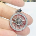 Silver round sun face pendant with cubic zirconia inlay and celestial metal detailing - Silver Sun Face With Zirconia