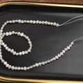Natural 4-5mm baroque freshwater pearl strand in milk white on a black tray - 4-5mm approx 35cm / Natural White