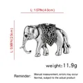 Silver elephant brooch with black enamel geometric patterns and white rhinestones - Elephant B07228