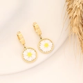 Golden daisy drop earrings with white petals and yellow centers on a clean background - White