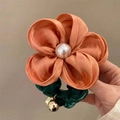 Orange satin flower scrunchie with a faux pearl center and dark green elastic band - Orange Flower Large Scrunchie