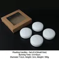 Set de 4 velas flotantes blancas en caja de kraft para bodas y decoración de cenas románticas - 4 Piezas (7.6x3cm)
