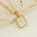 Gold Aries zodiac necklace with rectangular mother of pearl inlay on stone base - With Cable Chain / Aries