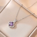 Elegant silver-tone necklace with a clover pendant featuring a large purple faceted gemstone - Clover Purple Zirconia Style (X0301) / Silver