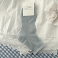 Chaussettes mi-mollet bleu-gris en coton avec dentelle côtelée et un pendentif nœud argenté - Taille unique / Bleu clair