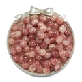 Pink and dark red spotted round resin beads for DIY jewelry making in a silver bow tray - Gilded Floral Bead - Light Red
