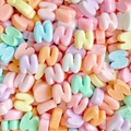Macro detail of colorful heart-shaped resin beads featuring embossed letter N - Letter N (Random Mixed One) / Small