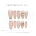 Detail of pink press-on nails with silver glitter, rhinestones and large 3D ribbon bows - Glitter Bowknot Nude Pink (90)