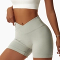 Hoch taillierte salbeigrüne Yoga-Shorts mit V-Kreuz-Bund und nahtloser Strickstruktur - 2XL / Hellkalk