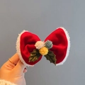 Christmas hair clip featuring a red velvet bow with white trim and holly leaf accents - Red Bow Clip