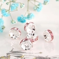 Macro shot of pink rhinestone spacer bead for DIY jewelry making with silver metal base - Silver Plated Light Pink