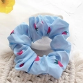 Blue scrunchie with red strawberry print made of lightweight floral chiffon fabric - Creamy Strawberry Blue