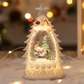 White Christmas tree snow globe with snowman interior and warm glowing LED lights - White Tree Snowman Scene