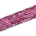 Macro shot of purple geode agate barrel beads with natural stone texture on white back - Barrel Beads 6x8mm/23pcs / Rose Red