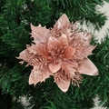 Rose gold artificial poinsettia flower with glitter finish on a green Christmas tree - 14.5cm / Rose Gold