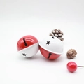Red and white two-tone metal Christmas bell with star cutouts and festive ornaments - White Red