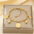 Gold multi-charm bracelet with sun symbols and round pendants on a jewelry box - Gold Coin Sun Pendant Style (KB204086-SXSJ)