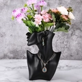 Artistic black resin portrait jewelry display stand for necklaces and floral arrangements - Black