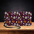 Long faux leather skull wallet with Halloween patterns and wrist strap on wooden surface - Halloween Skull Pumpkin Print-Deep Purple