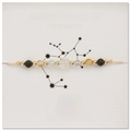 Detail of Sagittarius zodiac bracelet with natural obsidian and citrine beads on a card - Sagittarius