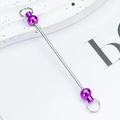 DIY beadable keychain rod with purple spherical accents on white marble surface - Deep purple