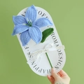 Handmade crochet blue lily flower with green leaves on gift card for Mother's Day - Lily - Blue